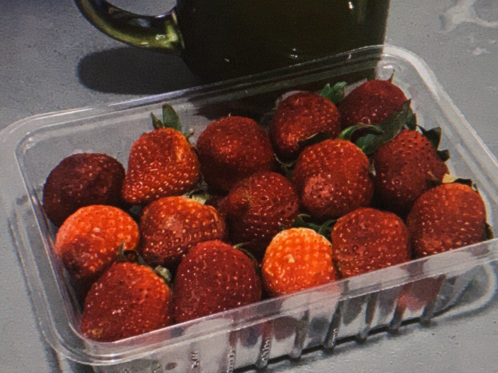 a tray of strawberries